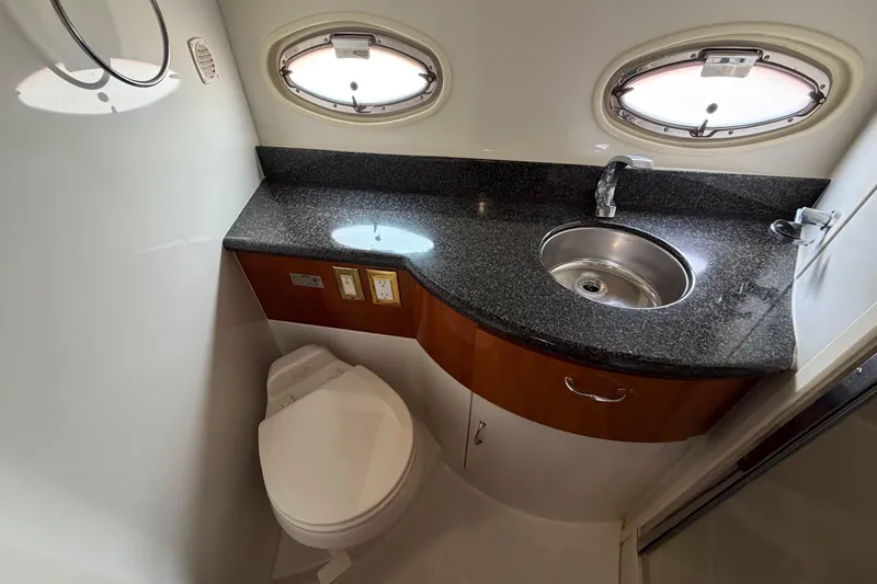 Slide: The Image of Luxurious bathroom in 2005 Carver 396 Aft Cabin Motor Yacht with granite countertop. - 15