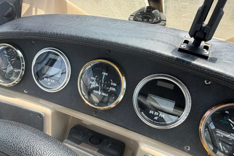 Slide: The Image of Dashboard of 2005 Carver 396 Aft Cabin Motor Yacht with RPM gauges and compass. - 7