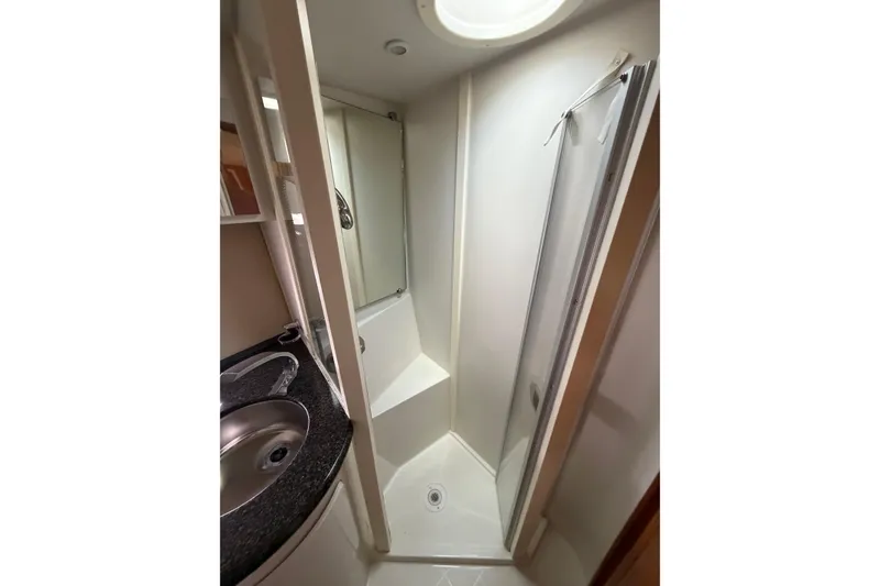 Slide: The Image of Bathroom interior of 2005 Carver 396 Aft Cabin Motor Yacht with shower and sink. - 18