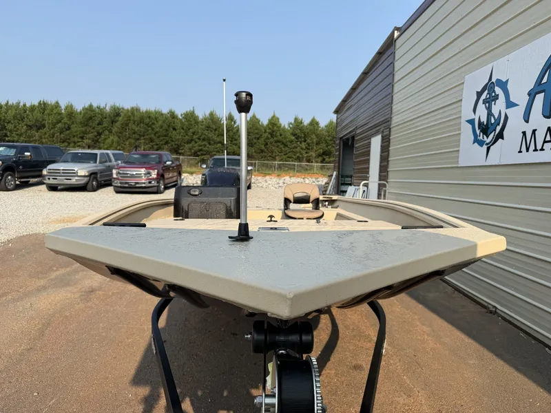 Slide: The Image of A G3 Gator Tough 18SC-90 SHO boat on a trailer in front of a building with an anchor logo. - 3