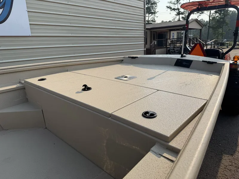 Slide: The Image of The image shows the deck of a 2027 G3 Gator Tough 18SC-90 SHO boat. It's beige with several hatches. - 5