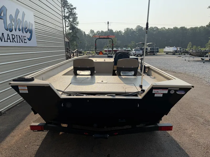 Slide: The Image of A G3 Gator Tough 18SC-90 SHO boat sits on a trailer next to a building. - 7
