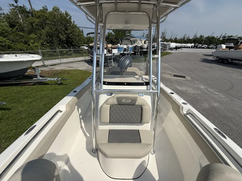 Slide: The Image of The image shows a 2027 Key West 203 FS boat with an open deck and seating. - 3