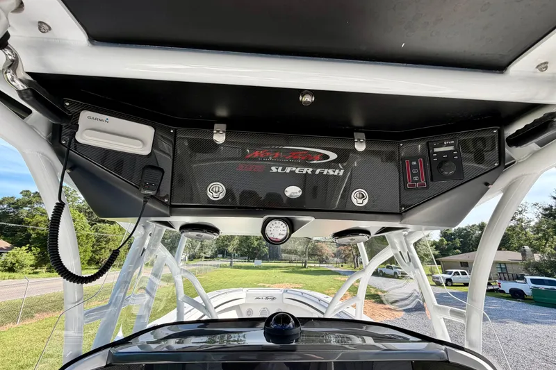 Slide: The Image of 2013 Nor-Tech 392 Super Fish boat console with Garmin electronics and control panel. - 18