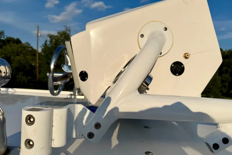 Slide: The Image of Close-up of 2013 Nor-Tech 392 Super Fish boat steering wheel and controls. - 48