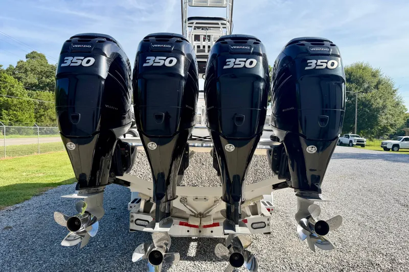 Slide: The Image of Four powerful outboard motors on a 2013 Nor-Tech 392 Super Fish boat. - 4
