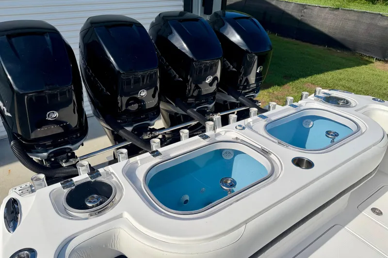 Slide: The Image of 2013 Nor-Tech 392 Super Fish boat with four powerful outboard engines and dual livewells. - 7