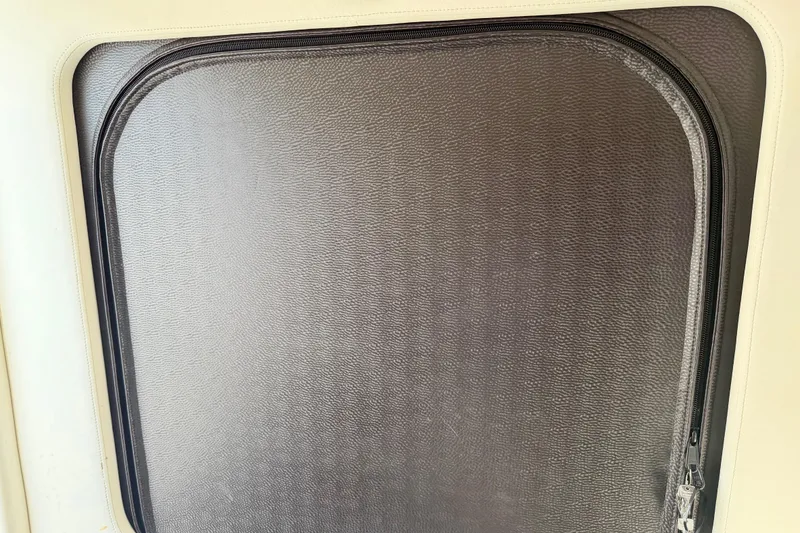 Slide: The Image of Zippered compartment on 2013 Nor-Tech 392 Super Fish boat. - 42