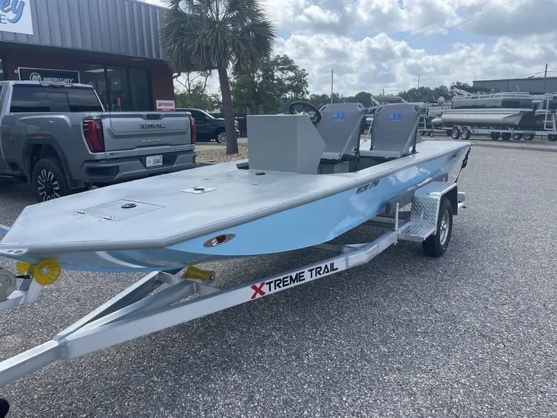 Slide: The Image of A 2027 XTREME BOATS Micro-X 1748 MICRO SKIFF on a trailer, ready for the water. - 2