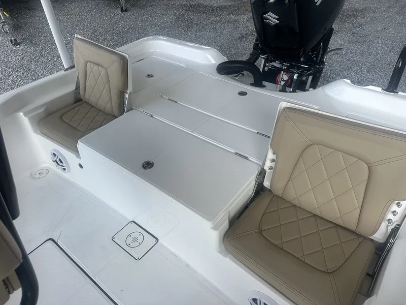 Slide: The Image of The image shows the interior of a 2026 Blazer PureBay 2400 with beige seats. - 13