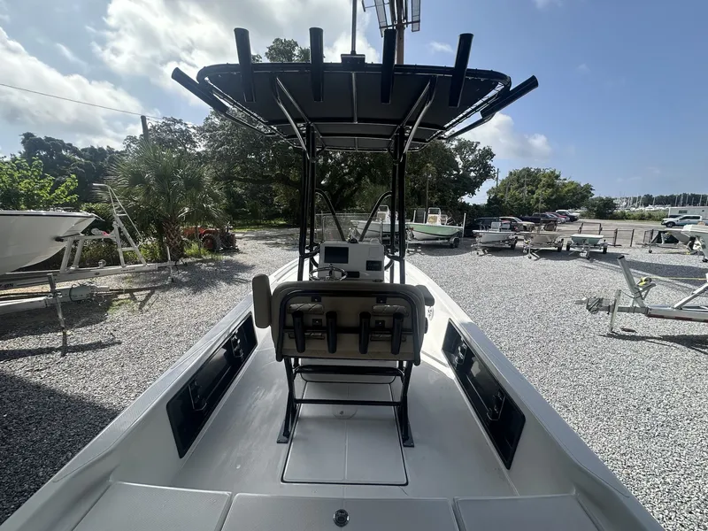 Slide: The Image of The image shows a boat with a central console and multiple fishing rod holders. - 14