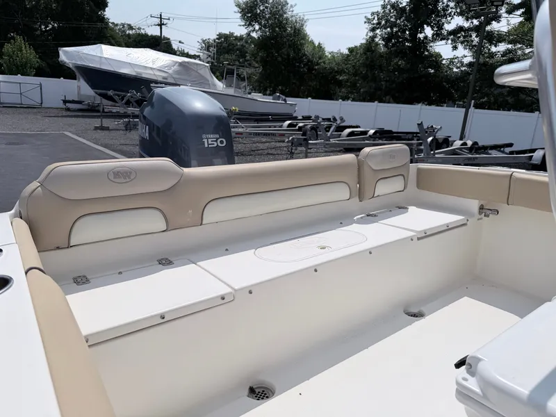 Slide: The Image of The image shows the stern of a 2014 Key West 219 FS boat with a Yamaha 150 engine. - 22