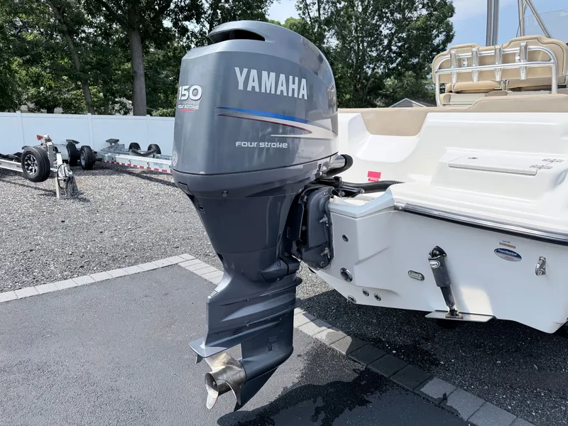Slide: The Image of A Yamaha 150 HP outboard motor is mounted on a Key West 219 FS boat. - 7