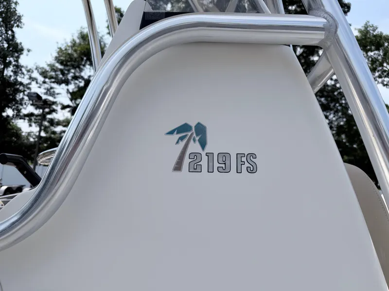 Slide: The Image of Close-up of the logo on a Key West 219 FS boat, year 2014. - 11