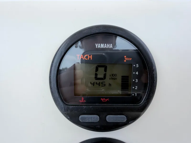 Slide: The Image of A Yamaha tachometer displays 445 operating hours. - 16