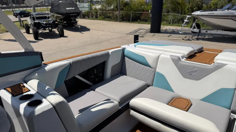 Slide: The Image of The image shows the interior of a 2021 Tigé Z3 boat with stylish seating. - 14
