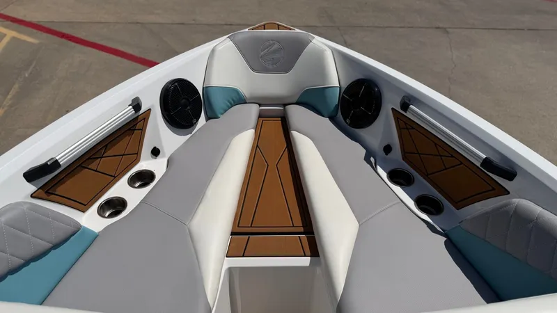 Slide: The Image of The image shows the bow of a 2021 Tigé Z3 boat with stylish seating and speakers. - 17