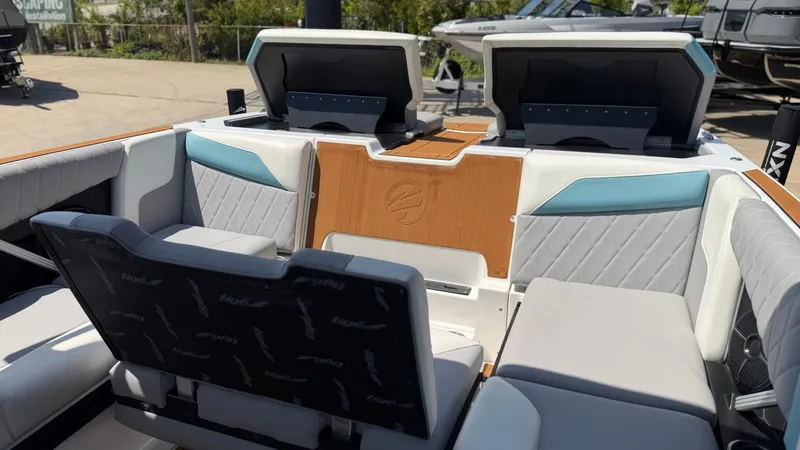 Slide: The Image of The image shows the interior of a 2021 Tigé Z3 boat with stylish seating. - 18
