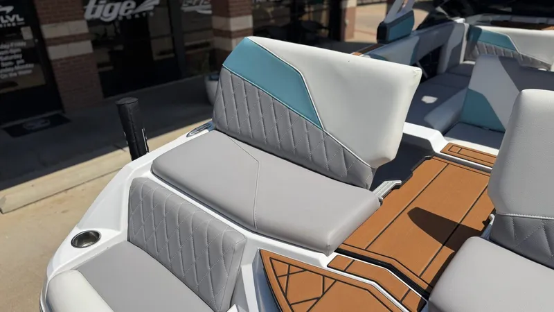 Slide: The Image of The image shows the stylish interior of a 2021 Tigé Z3 boat with modern seating. - 9