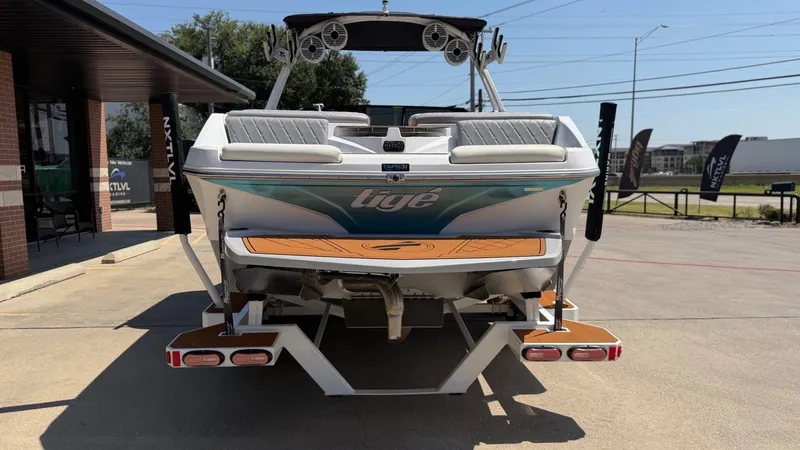 Slide: The Image of The image shows a 2021 Tigé Z3 boat with sleek design and modern features. - 4