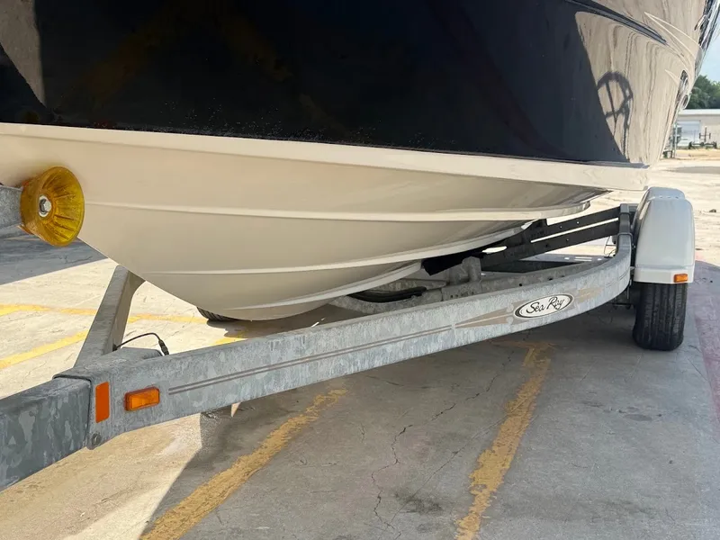 Slide: The Image of A 2007 Sea Ray 220 Sundeck on a trailer, ready for transport. - 10