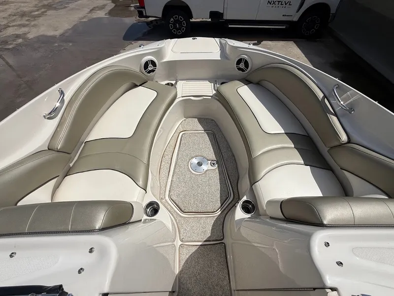 Slide: The Image of The image shows the bow area of a 2007 Sea Ray 220 Sundeck boat with cushioned seating. - 23