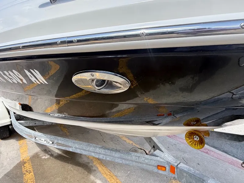 Slide: The Image of Close-up of a 2007 Sea Ray 220 Sundeck hull on a trailer. - 8