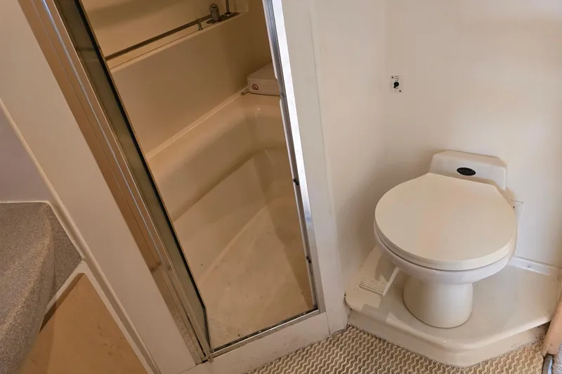 Slide: The Image of Bathroom interior of 1998 Carver 350 Mariner yacht with shower and toilet. - 38