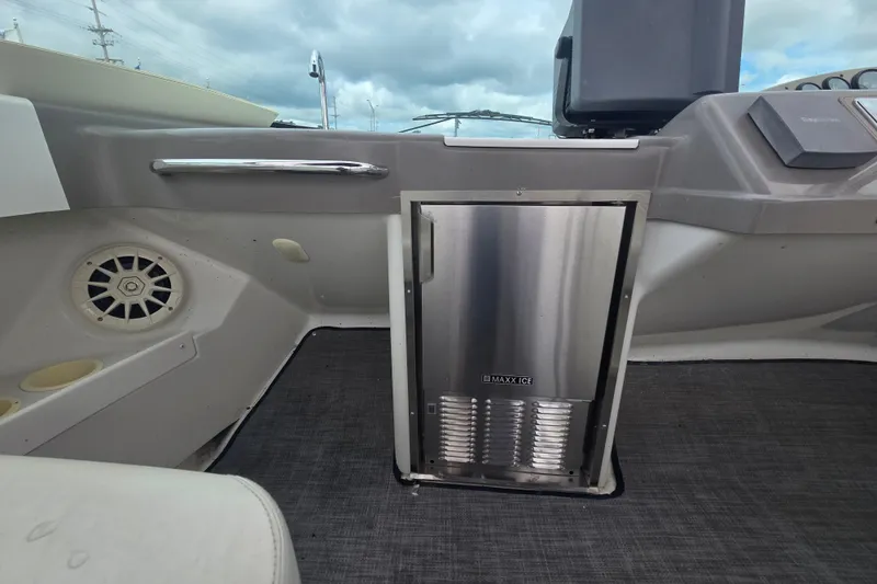 Slide: The Image of Interior of a 1998 Carver 350 Mariner featuring a Maxx Ice refrigerator. - 11