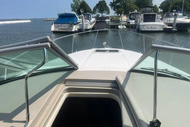 Slide: The Image of 2006 Sea Ray Sundancer 280 docked at marina, view from cockpit. - 9