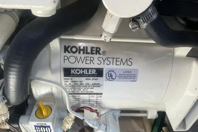Slide: The Image of Kohler Power Systems generator in a 2006 Sea Ray Sundancer 280 boat engine compartment. - 21