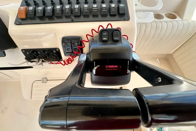 Slide: The Image of Control panel of a 2007 Grady-White Express 330 boat with Yamaha remote control. - 66