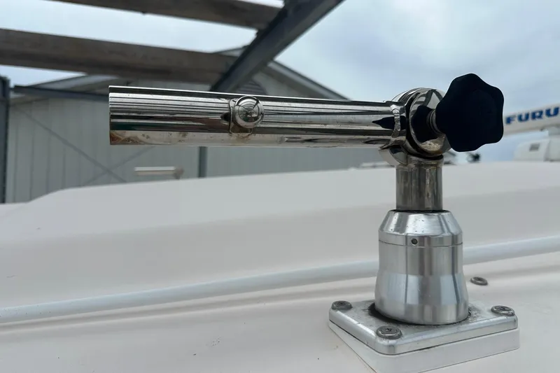 Slide: The Image of Close-up of a metal rod holder on a 2007 Grady-White Express 330 boat. - 10