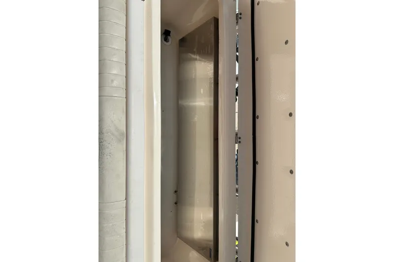 Slide: The Image of 2007 Grady-White Express 330 boat interior detail, showcasing storage compartment. - 107