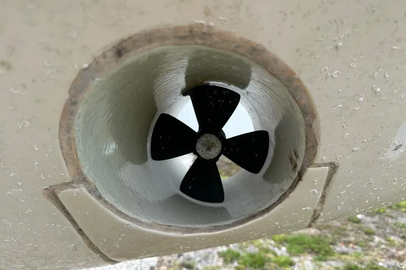 Slide: The Image of Close-up of a 2007 Grady-White Express 330 boat propeller in a tunnel. - 6