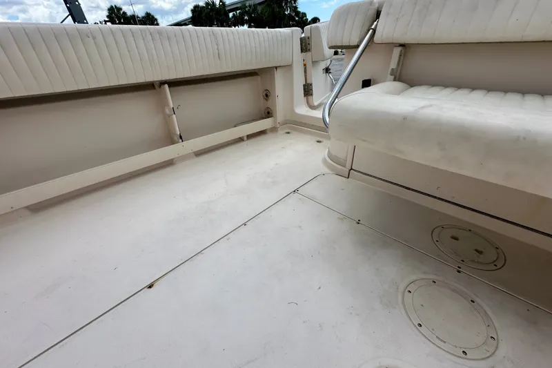Slide: The Image of 2007 Grady-White Express 330 boat interior with white seating and spacious deck. - 46