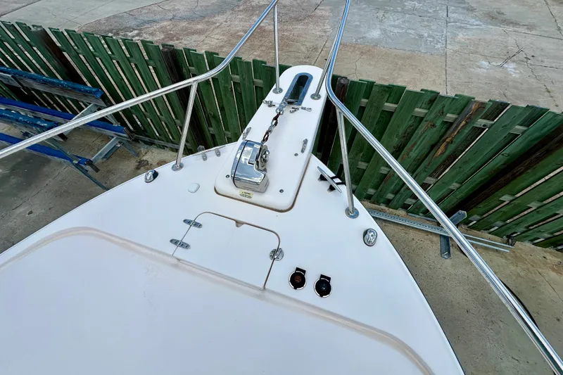 Slide: The Image of Bow of 2007 Grady-White Express 330 boat with anchor and railing. - 37