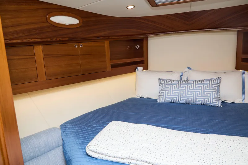 Slide: The Image of Luxurious cabin interior of 2027 Palm Beach 42 yacht with elegant wood finish. - 37