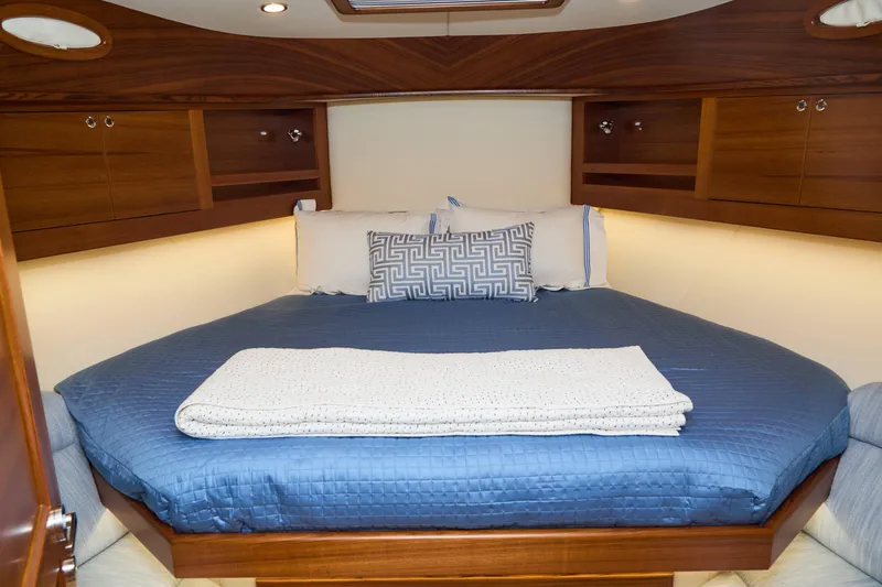 Slide: The Image of Luxurious cabin interior of 2027 Palm Beach 42 yacht with cozy bedding. - 36