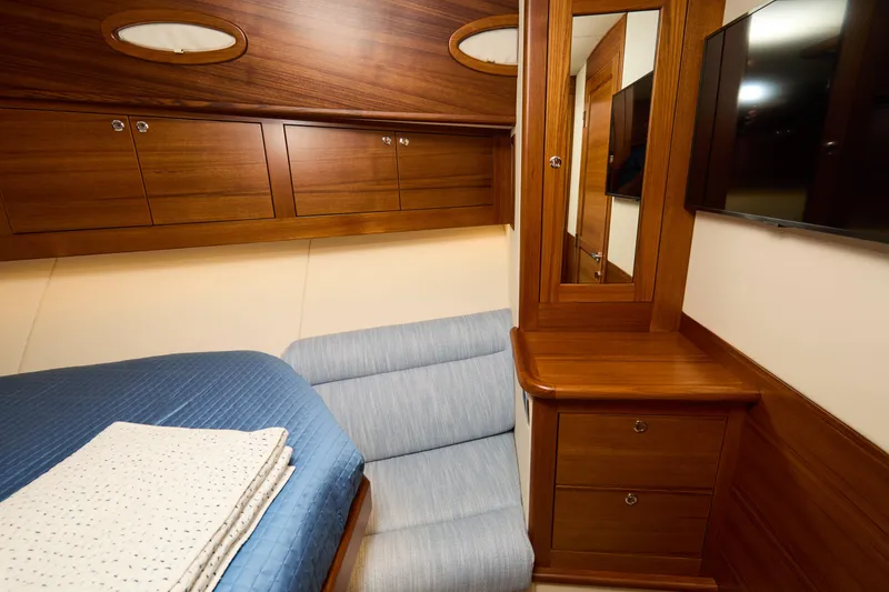 Slide: The Image of Luxurious cabin interior of 2027 Palm Beach 42 yacht with wood finish and modern amenities. - 40