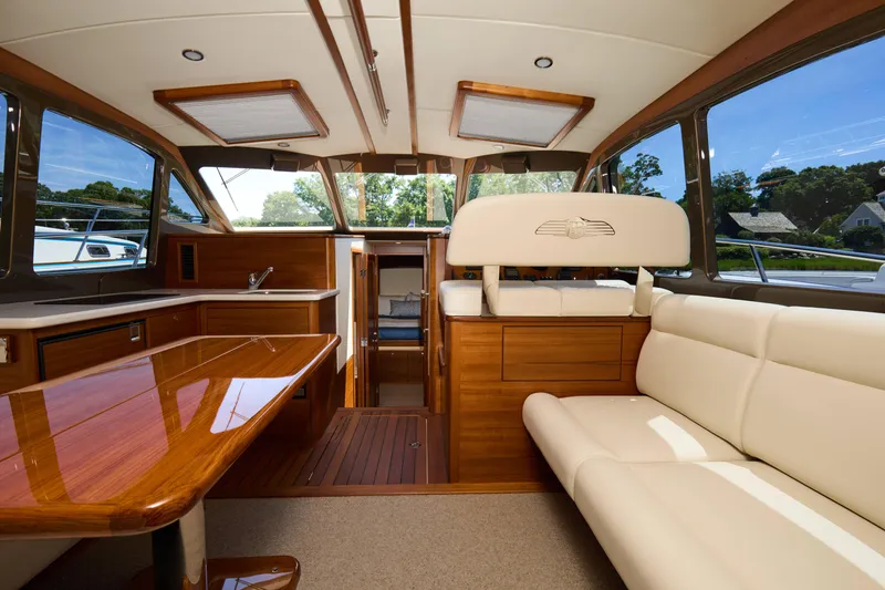 Slide: The Image of Luxurious interior of 2027 Palm Beach 42 yacht with elegant wood and leather finishes. - 19