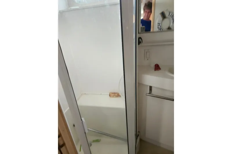 Slide: The Image of Bathroom interior of 1993 Silverton 46 Motor Yacht with shower and sink. - 40