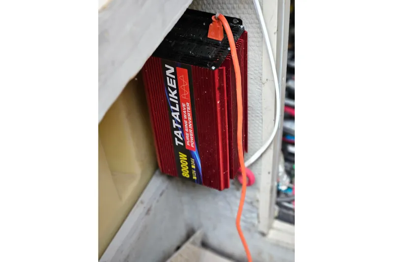 Slide: The Image of Red power inverter installed on a 1993 Silverton 46 Motor Yacht. - 46