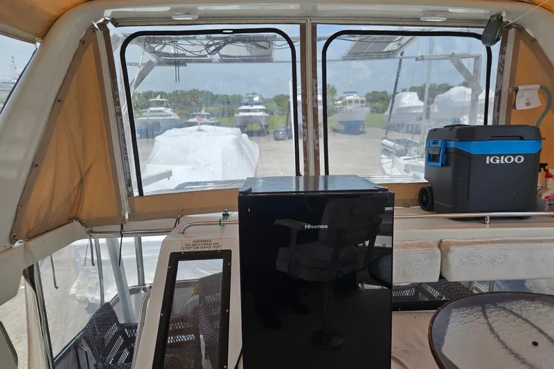 Slide: The Image of Interior view of 1993 Silverton 46 Motor Yacht with fridge and cooler. - 15