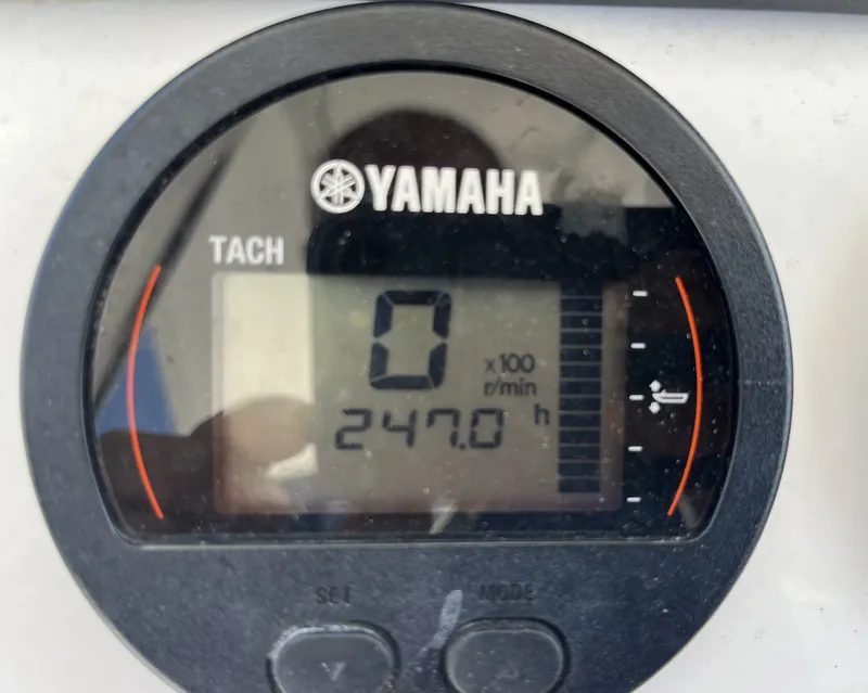 Slide: The Image of A Yamaha tachometer displays 247 operating hours. - 12