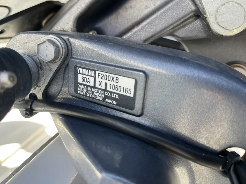 Slide: The Image of Close-up of a Yamaha engine part with serial number and manufacturing details. - 8