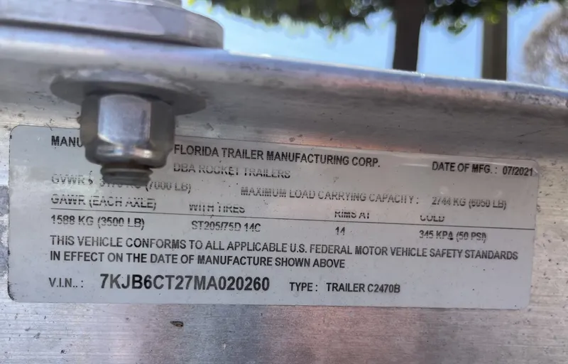 Slide: The Image of A Florida trailer nameplate with technical specifications and a serial number. - 25