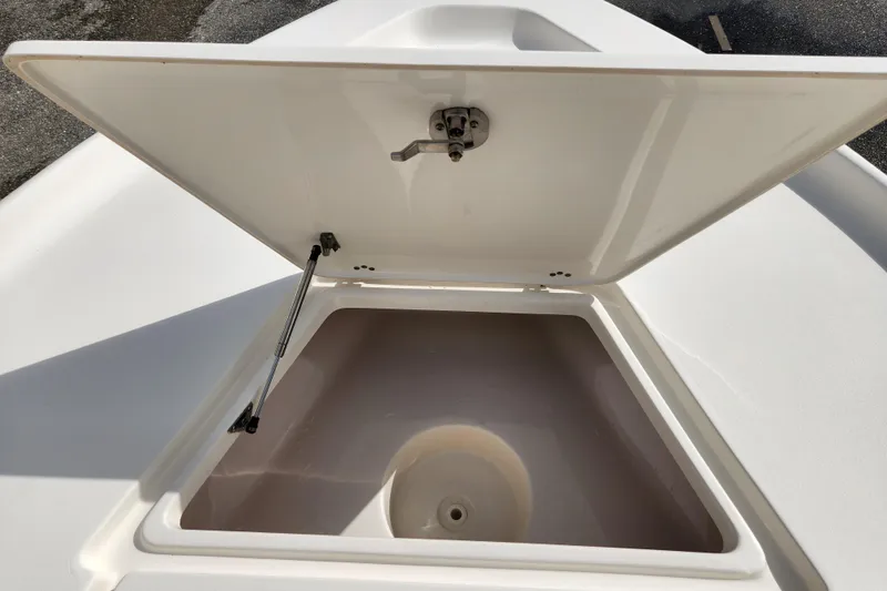Slide: The Image of Open storage compartment on 2019 Key West 230 Bay Reef boat. - 26