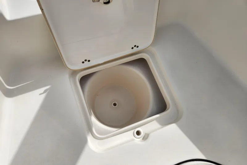 Slide: The Image of Open storage compartment on 2019 Key West 230 Bay Reef boat. - 23