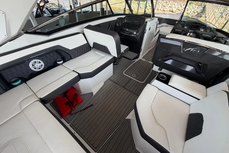 Slide: The Image of 2020 Monterey 298SS Super Sport boat interior with sleek seating and modern dashboard design. - 7